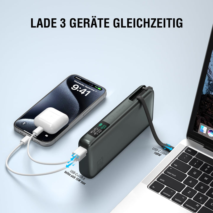 powerbank-enterprise-mit-integriertem-usb-c-kabel-20000mah-130w-spacegrau-D541076 - Powerbank lädt drei Geräte gleichzeitig, darunter ein Smartphone, Earpods und ein Laptop.