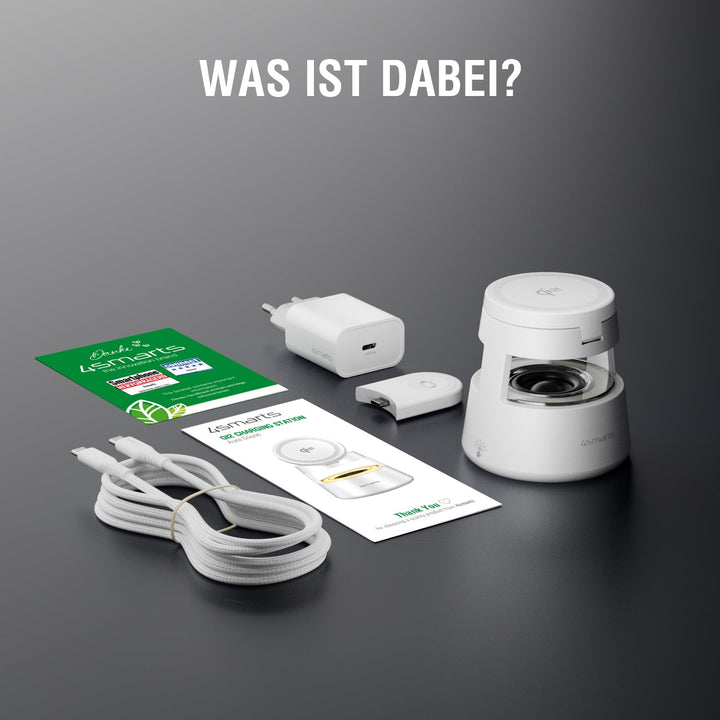 Lieferumfang der Qi2 Charging Station Aura Sound in Weiß: Ladestation, Netzteil, USB-C-Kabel, Magnetadapter und Informationskarten.