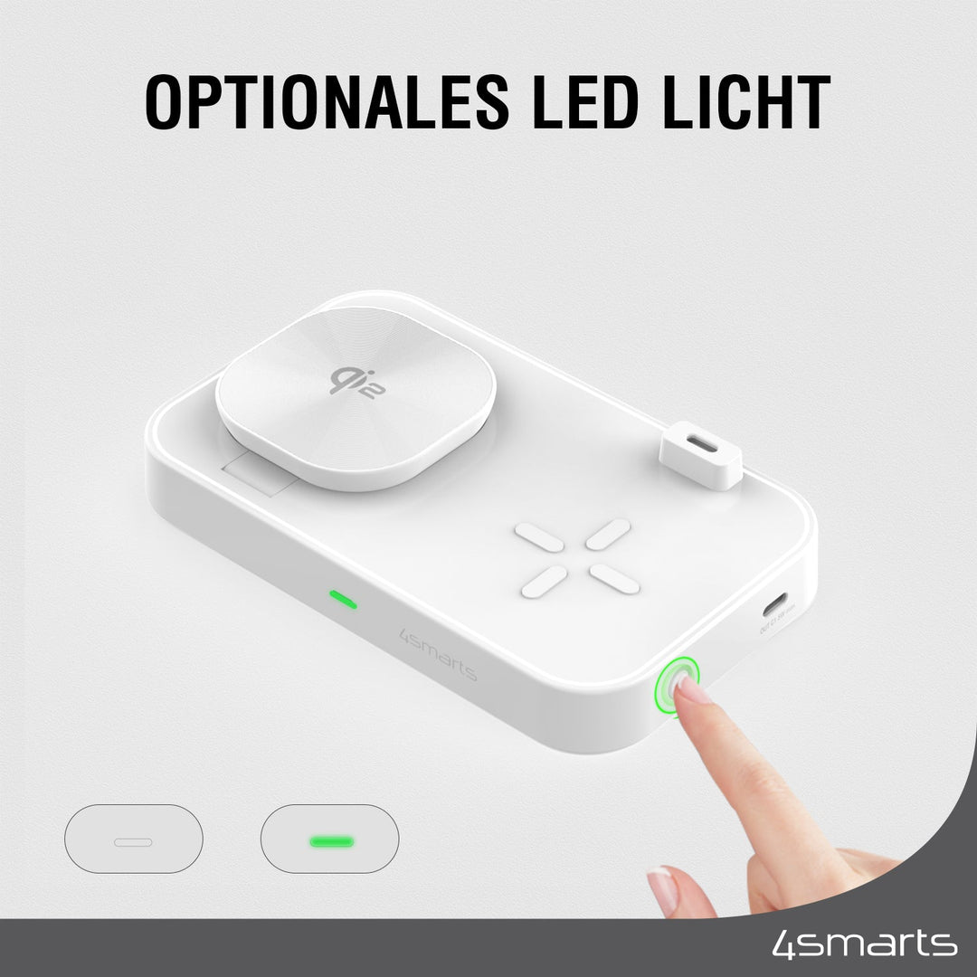 Nahaufnahme der Qi2 Ladestation Trident Weiß mit einem optionalen LED-Licht, das durch einen Knopfdruck aktiviert werden kann. Der Text lautet "OPTIONALES LED LICHT".